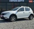 Белый Рено Сандеро, объемом двигателя 1.46 л и пробегом 142 тыс. км за 11999 $, фото 1 на Automoto.ua