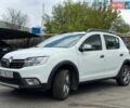 Белый Рено Сандеро, объемом двигателя 1.46 л и пробегом 77 тыс. км за 11500 $, фото 1 на Automoto.ua