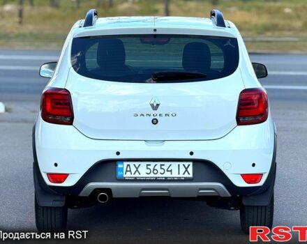 Белый Рено Сандеро, объемом двигателя 0.9 л и пробегом 50 тыс. км за 11600 $, фото 2 на Automoto.ua