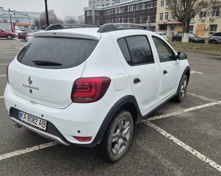 Білий Рено Сандеро, об'ємом двигуна 1.46 л та пробігом 75 тис. км за 13200 $, фото 1 на Automoto.ua