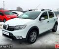 Білий Рено Сандеро, об'ємом двигуна 1.5 л та пробігом 75 тис. км за 12500 $, фото 1 на Automoto.ua