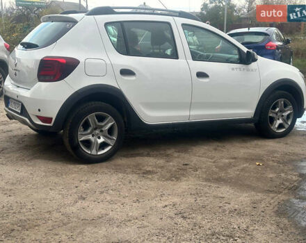 Белый Рено Сандеро, объемом двигателя 0.9 л и пробегом 101 тыс. км за 9550 $, фото 3 на Automoto.ua