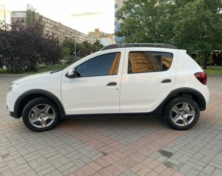 Белый Рено Сандеро, объемом двигателя 1.5 л и пробегом 65 тыс. км за 12700 $, фото 1 на Automoto.ua