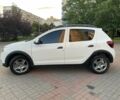 Белый Рено Сандеро, объемом двигателя 1.5 л и пробегом 65 тыс. км за 12700 $, фото 1 на Automoto.ua