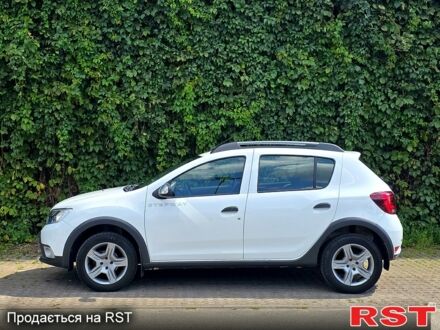 Белый Рено Сандеро, объемом двигателя 1 л и пробегом 57 тыс. км за 9500 $, фото 1 на Automoto.ua