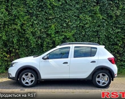 Белый Рено Сандеро, объемом двигателя 1 л и пробегом 57 тыс. км за 9500 $, фото 1 на Automoto.ua