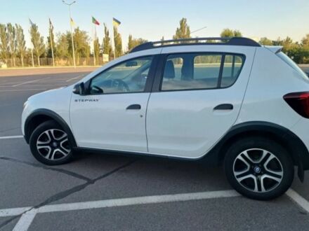Білий Рено Сандеро, об'ємом двигуна 1.5 л та пробігом 250 тис. км за 5500 $, фото 1 на Automoto.ua