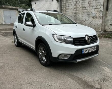 Белый Рено Сандеро, объемом двигателя 0.9 л и пробегом 276 тыс. км за 7500 $, фото 1 на Automoto.ua