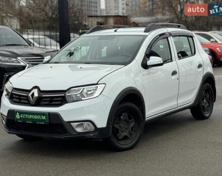 Белый Рено Сандеро, объемом двигателя 0.9 л и пробегом 99 тыс. км за 9399 $, фото 1 на Automoto.ua