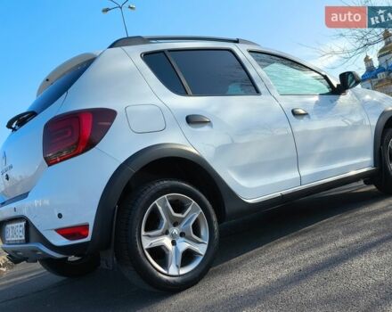 Белый Рено Сандеро, объемом двигателя 1.46 л и пробегом 65 тыс. км за 12700 $, фото 1 на Automoto.ua