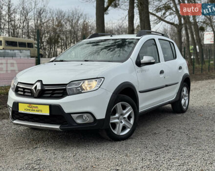 Белый Рено Сандеро, объемом двигателя 0.9 л и пробегом 65 тыс. км за 10000 $, фото 1 на Automoto.ua