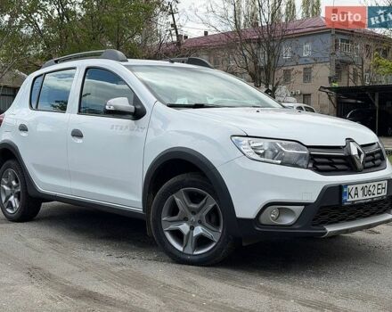 Белый Рено Сандеро, объемом двигателя 1.46 л и пробегом 77 тыс. км за 11500 $, фото 1 на Automoto.ua
