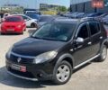 Черный Рено Сандеро, объемом двигателя 1.6 л и пробегом 102 тыс. км за 6990 $, фото 1 на Automoto.ua