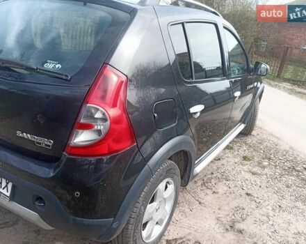Черный Рено Сандеро, объемом двигателя 1.6 л и пробегом 222 тыс. км за 5900 $, фото 4 на Automoto.ua