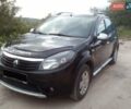 Черный Рено Сандеро, объемом двигателя 1.6 л и пробегом 222 тыс. км за 5900 $, фото 1 на Automoto.ua