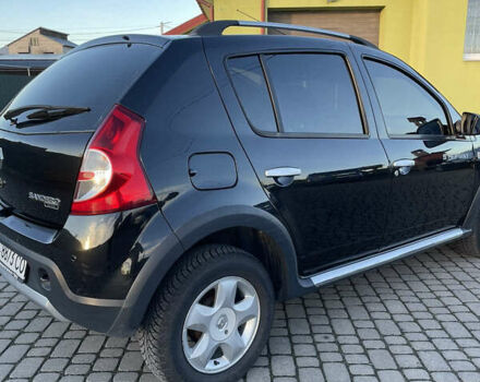 Черный Рено Сандеро, объемом двигателя 1.6 л и пробегом 98 тыс. км за 6600 $, фото 8 на Automoto.ua