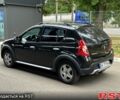 Черный Рено Сандеро, объемом двигателя 1.6 л и пробегом 195 тыс. км за 6500 $, фото 4 на Automoto.ua