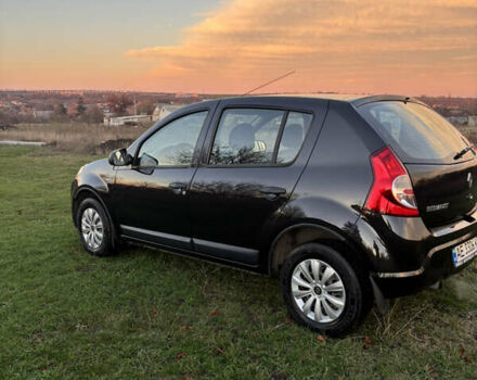 Черный Рено Сандеро, объемом двигателя 1.39 л и пробегом 189 тыс. км за 3999 $, фото 4 на Automoto.ua