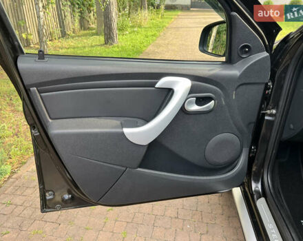 Чорний Рено Сандеро, об'ємом двигуна 1.6 л та пробігом 81 тис. км за 8700 $, фото 24 на Automoto.ua