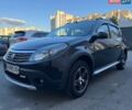 Черный Рено Сандеро, объемом двигателя 1.6 л и пробегом 125 тыс. км за 5000 $, фото 1 на Automoto.ua