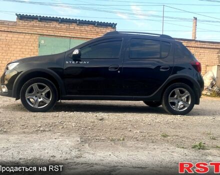 Черный Рено Сандеро, объемом двигателя 0.9 л и пробегом 40 тыс. км за 10200 $, фото 2 на Automoto.ua