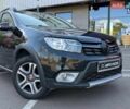 Черный Рено Сандеро, объемом двигателя 0.9 л и пробегом 62 тыс. км за 9790 $, фото 1 на Automoto.ua