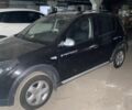 Черный Рено Сандеро, объемом двигателя 1.6 л и пробегом 88 тыс. км за 7000 $, фото 1 на Automoto.ua
