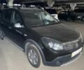 Черный Рено Сандеро, объемом двигателя 1.6 л и пробегом 88 тыс. км за 7000 $, фото 4 на Automoto.ua