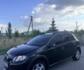 Черный Рено Сандеро, объемом двигателя 1.6 л и пробегом 200 тыс. км за 7495 $, фото 1 на Automoto.ua