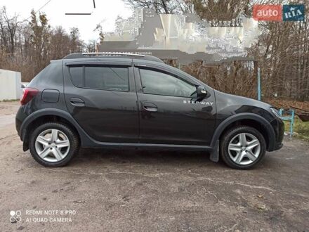 Черный Рено Сандеро, объемом двигателя 1.6 л и пробегом 48 тыс. км за 8500 $, фото 1 на Automoto.ua