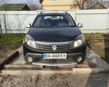 Черный Рено Сандеро, объемом двигателя 1.6 л и пробегом 197 тыс. км за 4200 $, фото 1 на Automoto.ua