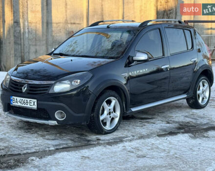Черный Рено Сандеро, объемом двигателя 1.6 л и пробегом 194 тыс. км за 6500 $, фото 1 на Automoto.ua