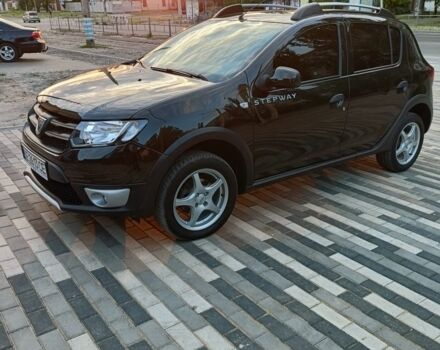 Черный Рено Сандеро, объемом двигателя 1.5 л и пробегом 220 тыс. км за 10000 $, фото 1 на Automoto.ua