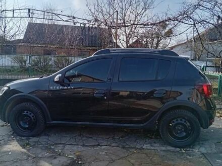 Черный Рено Сандеро, объемом двигателя 0.9 л и пробегом 31 тыс. км за 13000 $, фото 1 на Automoto.ua