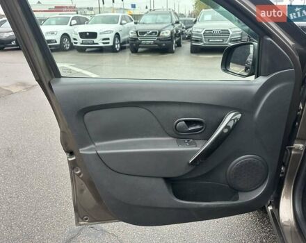 Коричневый Рено Сандеро, объемом двигателя 1 л и пробегом 97 тыс. км за 7950 $, фото 13 на Automoto.ua