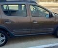 Коричневый Рено Сандеро, объемом двигателя 1.5 л и пробегом 32 тыс. км за 14005 $, фото 1 на Automoto.ua