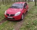 Красный Рено Сандеро, объемом двигателя 1.4 л и пробегом 245 тыс. км за 3988 $, фото 1 на Automoto.ua