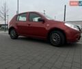 Красный Рено Сандеро, объемом двигателя 1.39 л и пробегом 260 тыс. км за 4000 $, фото 1 на Automoto.ua