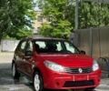 Красный Рено Сандеро, объемом двигателя 1.39 л и пробегом 168 тыс. км за 3499 $, фото 1 на Automoto.ua