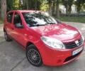 Красный Рено Сандеро, объемом двигателя 1.4 л и пробегом 161 тыс. км за 3850 $, фото 1 на Automoto.ua