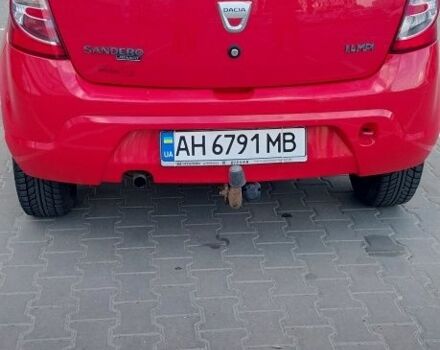 Рено Сандеро 2009 в Киеве на Automoto.ua Красный Рено Сандеро, объемом двигателя 1.4 л и пробегом 131 тыс. км за 4400 $, фото 5 на Automoto.ua