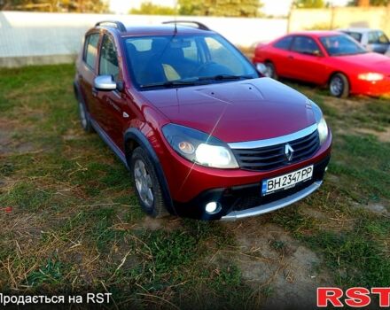 Красный Рено Сандеро, объемом двигателя 1.6 л и пробегом 250 тыс. км за 4800 $, фото 7 на Automoto.ua