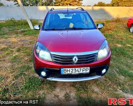 Красный Рено Сандеро, объемом двигателя 1.6 л и пробегом 250 тыс. км за 4800 $, фото 6 на Automoto.ua