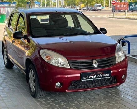 Красный Рено Сандеро, объемом двигателя 1.39 л и пробегом 97 тыс. км за 6199 $, фото 2 на Automoto.ua