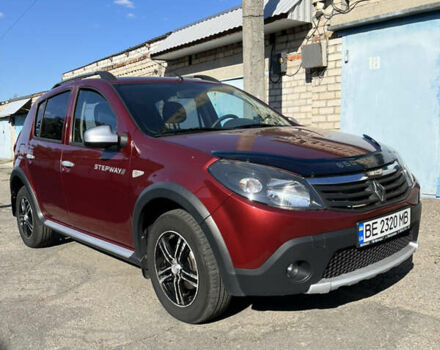 Красный Рено Сандеро, объемом двигателя 1.6 л и пробегом 113 тыс. км за 7800 $, фото 2 на Automoto.ua