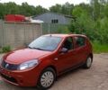 Красный Рено Сандеро, объемом двигателя 1.4 л и пробегом 190 тыс. км за 4750 $, фото 1 на Automoto.ua