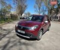 Красный Рено Сандеро, объемом двигателя 1.6 л и пробегом 136 тыс. км за 7500 $, фото 1 на Automoto.ua