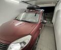 Красный Рено Сандеро, объемом двигателя 1.39 л и пробегом 102 тыс. км за 6200 $, фото 1 на Automoto.ua