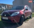 Красный Рено Сандеро, объемом двигателя 1.6 л и пробегом 124 тыс. км за 6000 $, фото 1 на Automoto.ua
