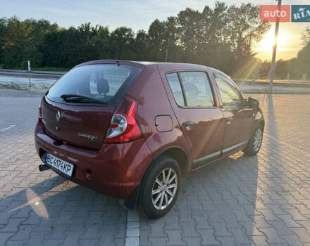Рено Сандеро 2011 в Львове на Automoto.ua Красный Рено Сандеро, объемом двигателя 1.39 л и пробегом 252 тыс. км за 3700 $, фото 4 на Automoto.ua